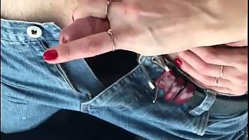 stroke small dick in car outside using phone with other hand